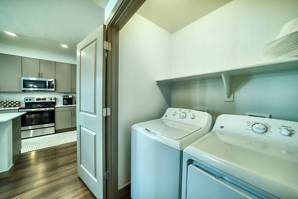 laundry room at Elevation at the Village Apartments