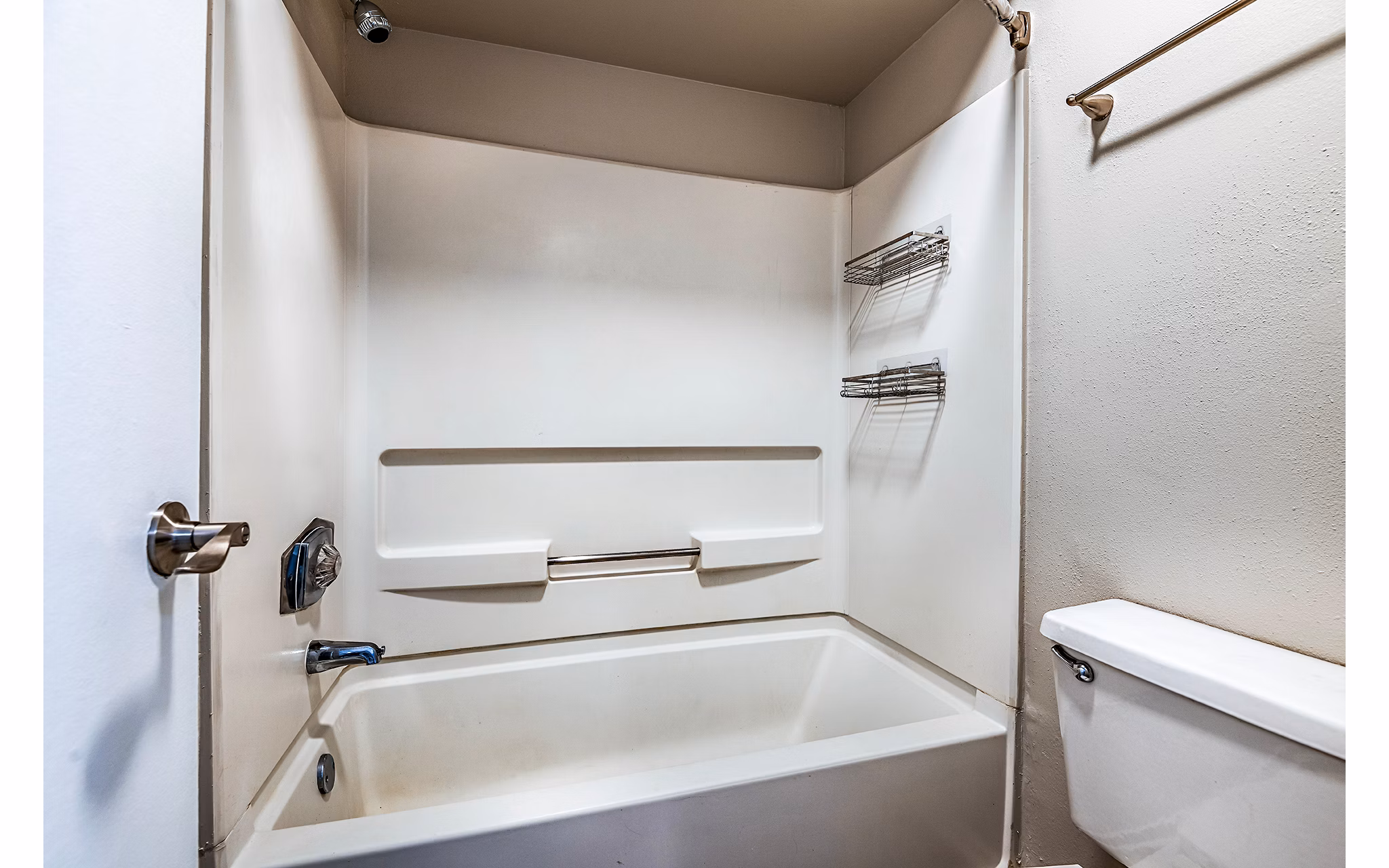 Bathroom featuring elegant fixtures and marble countertops in Heron Lake Apartments