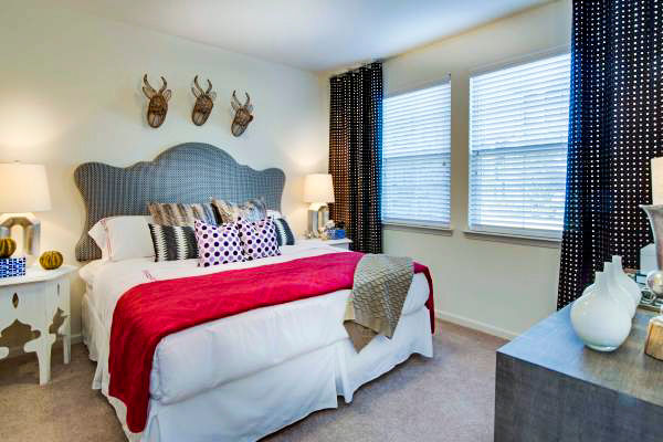 Bedroom featuring modern design and cozy decor at Tapestry at Lake Park Apartments