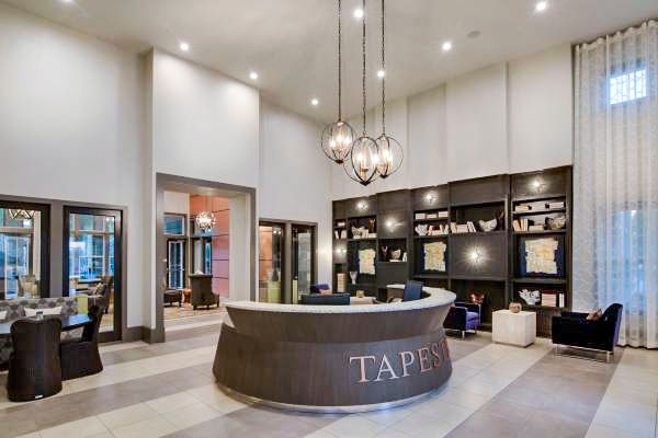 Clubhouse featuring modern seating and elegant decor at Tapestry at Lake Park Apartments