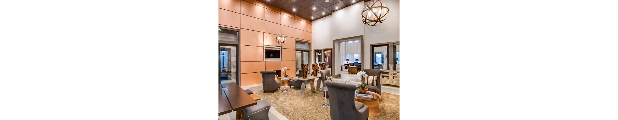 Modern clubhouse at Tapestry at Lake Park Apartments features elegant design and community spaces, perfect for social gatherings and events