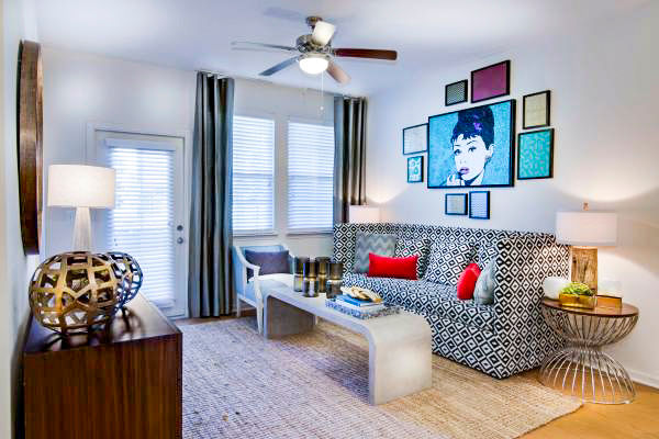 Modern living room with stylish decor and natural light at Tapestry at Lake Park Apartments