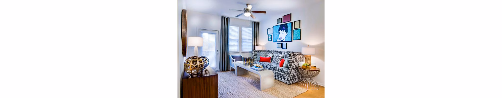 Modern living room with stylish decor and natural light at Tapestry at Lake Park Apartments