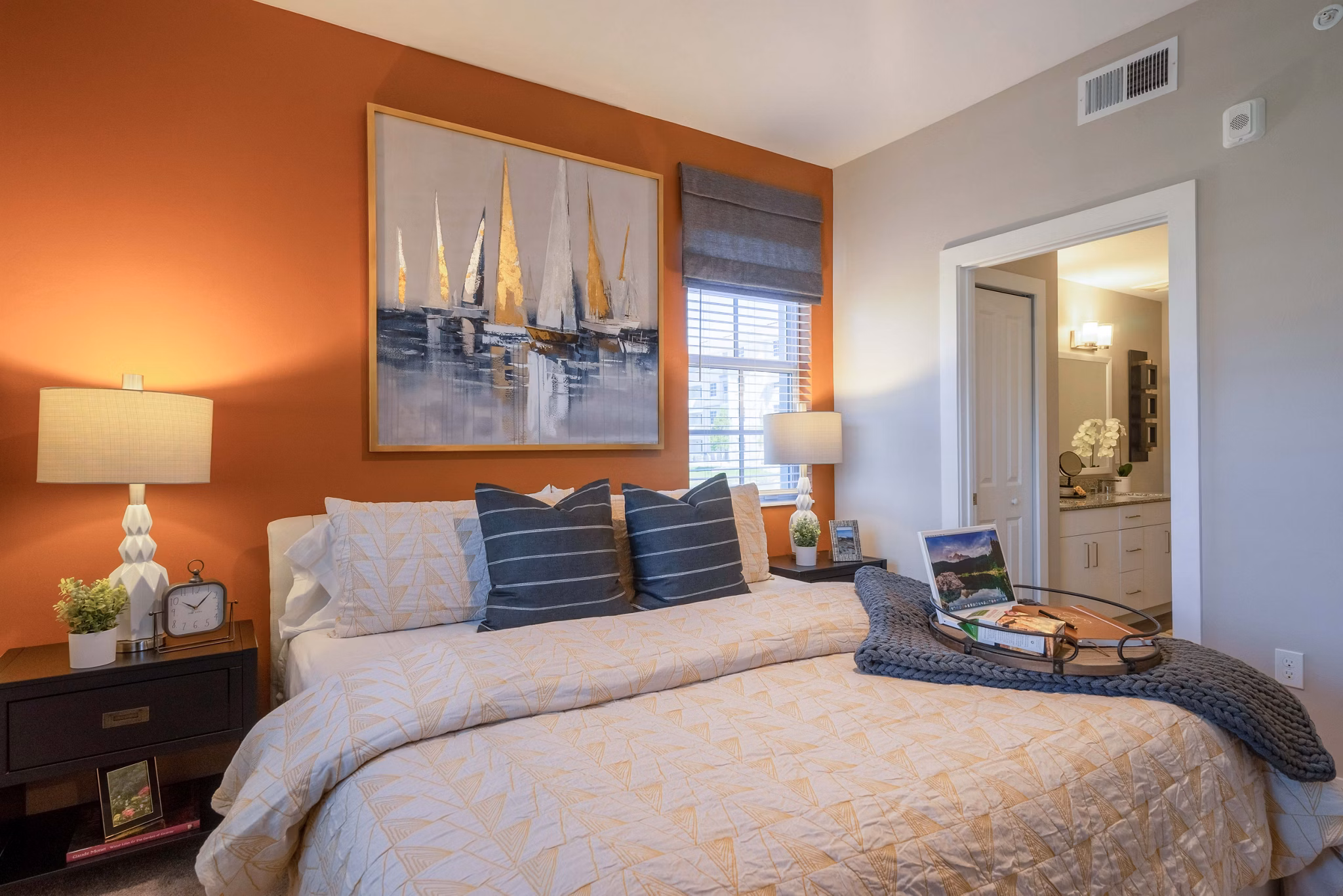 Modern bedroom with elegant decor at The Palms at Cape Coral Apartments, offering luxury living in a serene setting