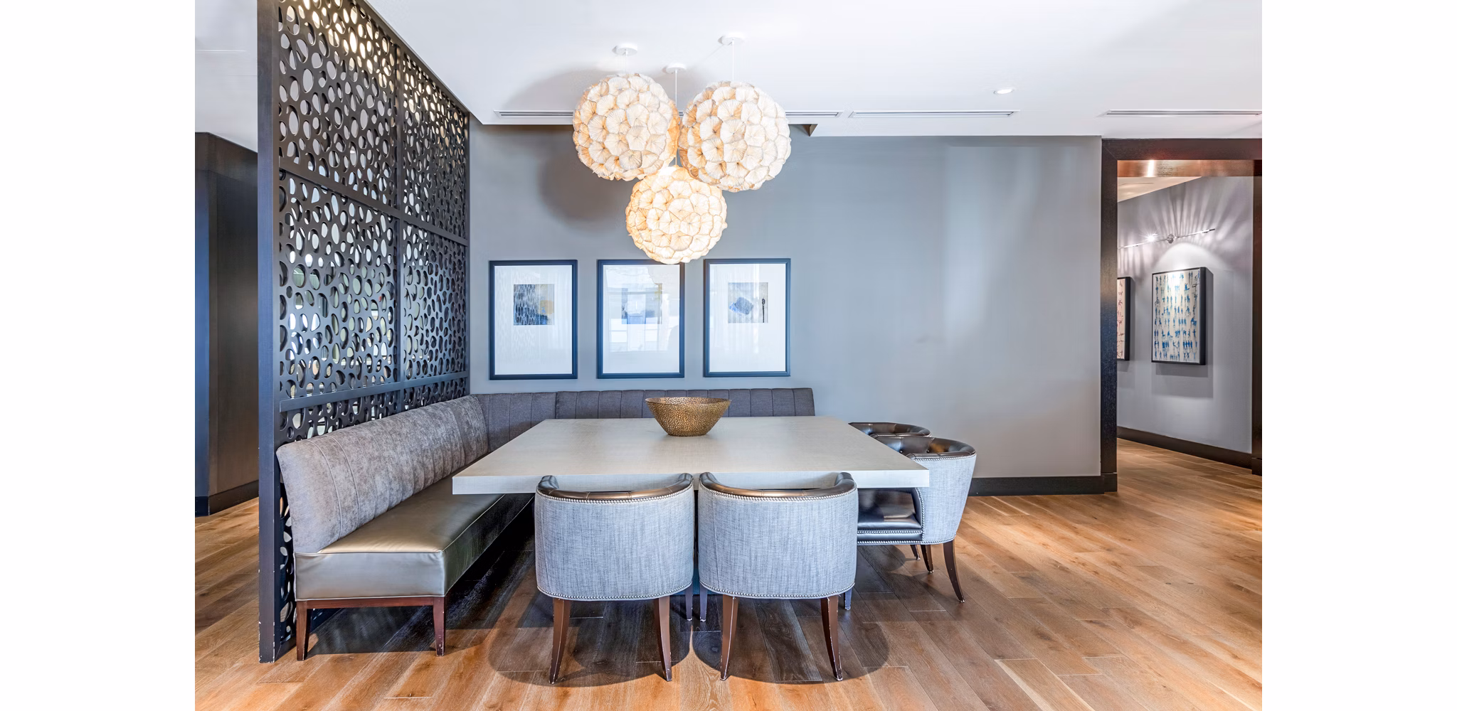 Clubhouse lobby featuring contemporary design and cozy seating at Esplanade at National Harbor Apartments
