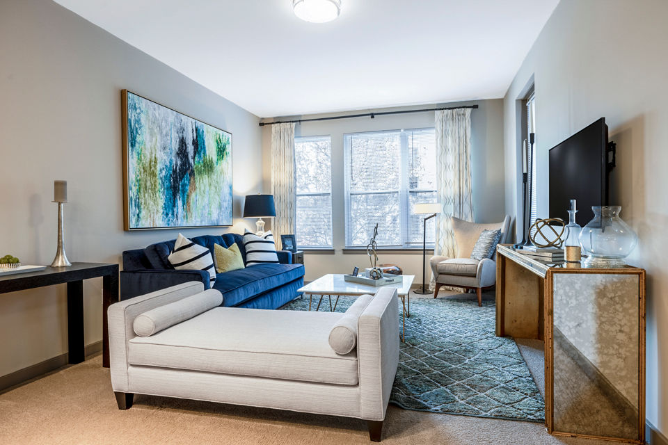 Modern living room with sleek furnishings at Esplanade at National Harbor Apartments