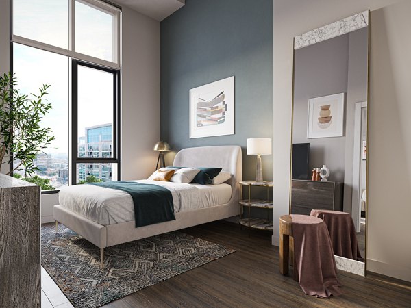 Cozy bedroom with modern decor at One Six Six Apartments, featuring luxury amenities and stylish design