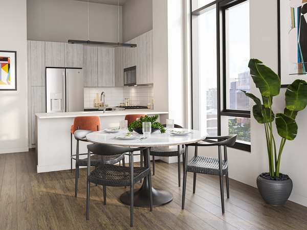 Dining area with sleek furniture and modern lighting at One Six Six Apartments, ideal for luxury living