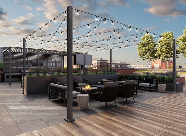 Chic fire pit lounge area at One Six Six Apartments offering cozy outdoor seating and modern design elements for socializing and relaxation
