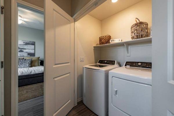 laundry room at Vlux at Sunset Farms Apartments