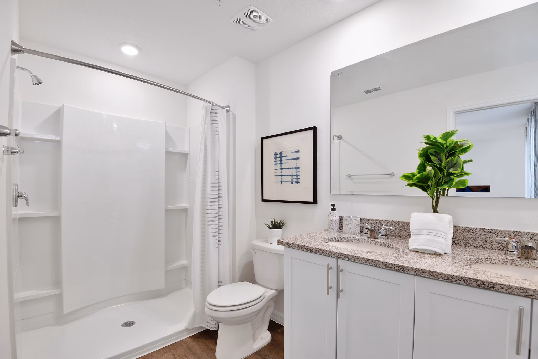 Summerwell Avian Pointe: Elegant bathroom with sleek fixtures in luxury apartments