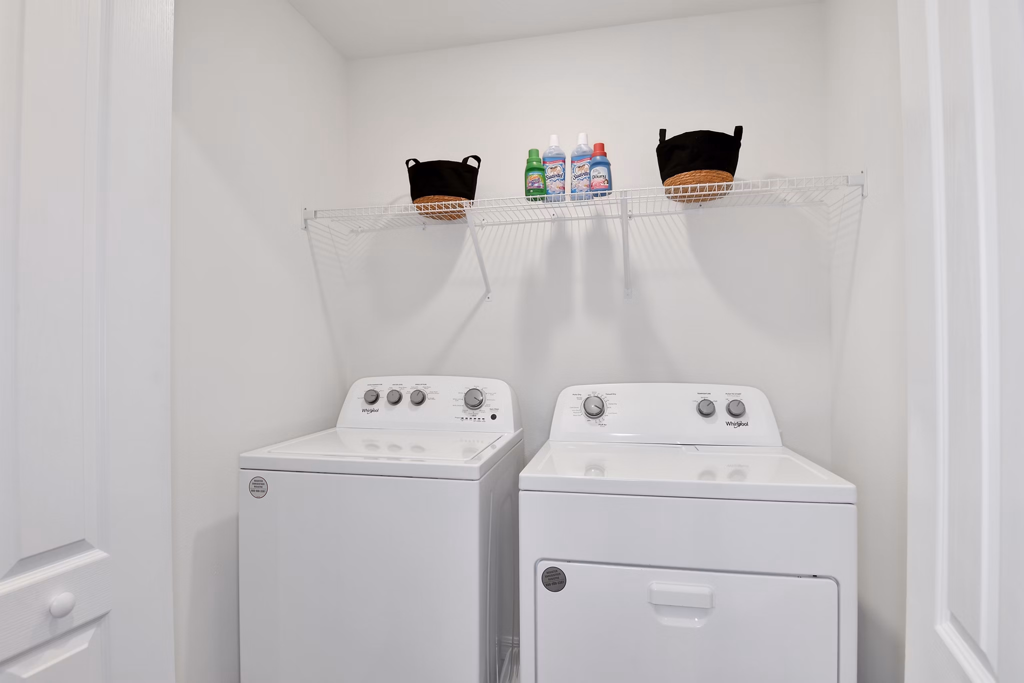 Laundry room featuring modern appliances at Summerwell Avian Pointe Apartments