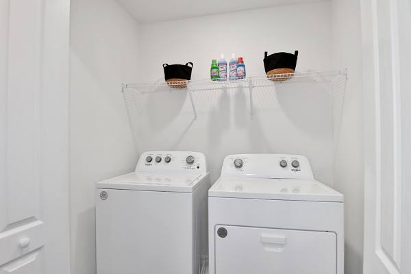 laundry room at Summerwell Avian Pointe Apartments