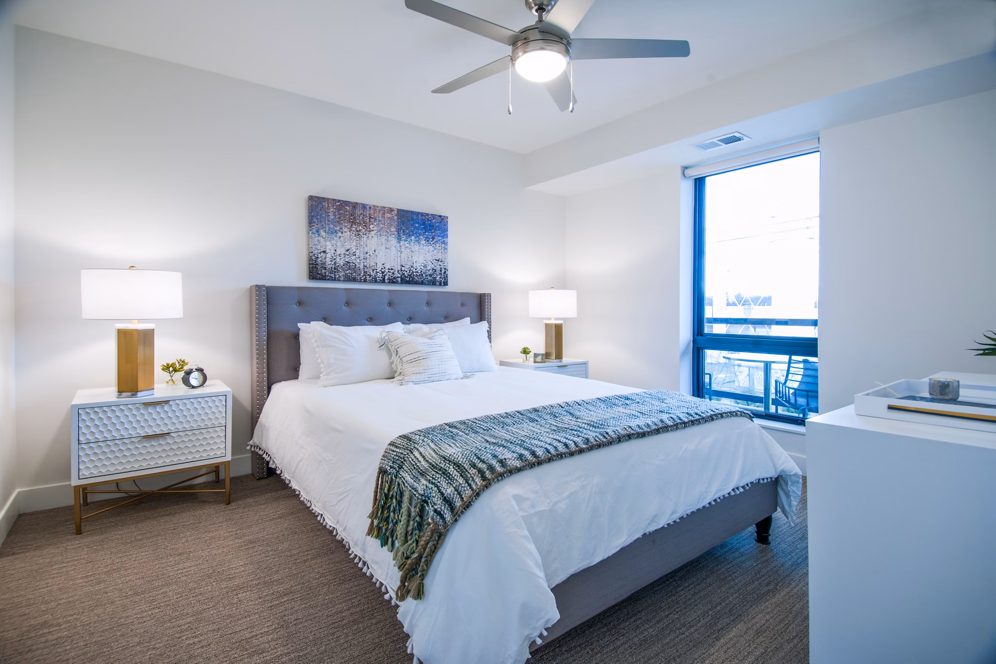Elegant bedroom with modern furnishings at Avidor Glenview Apartments for comfortable living