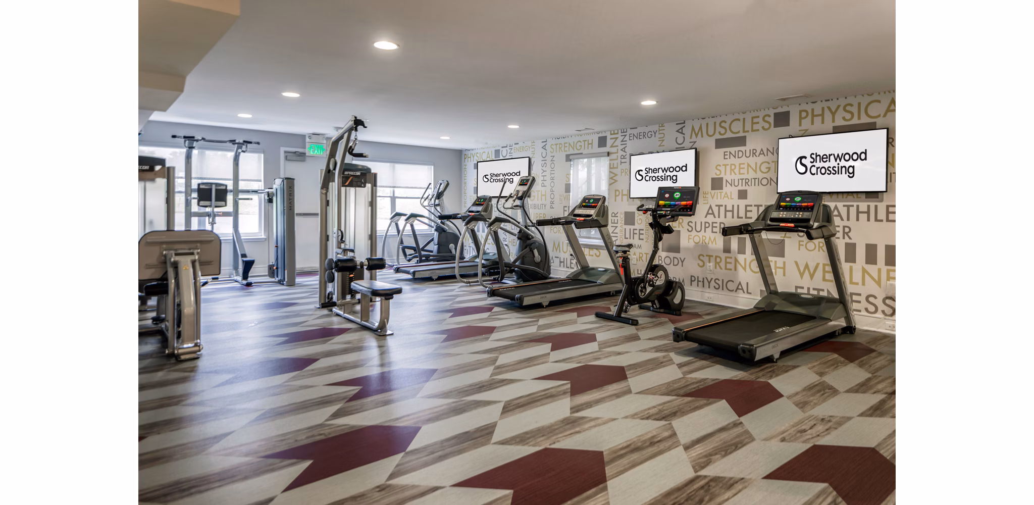 Fitness center with modern equipment at Sherwood Crossing apartments
