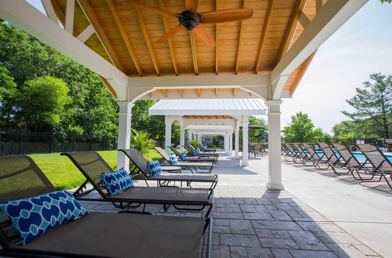 Outdoor pool with sun loungers at Sherwood Crossing luxury apartments