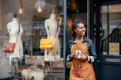 Woman standing outside of a store